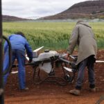 Aerial view of a utility inspection using drones for photogrammetry, showcasing infrastructure maintenance.